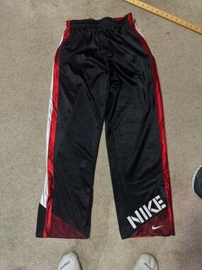 Vintage Nike Reversible Satin Track Pants Red and Black

Small - Medium